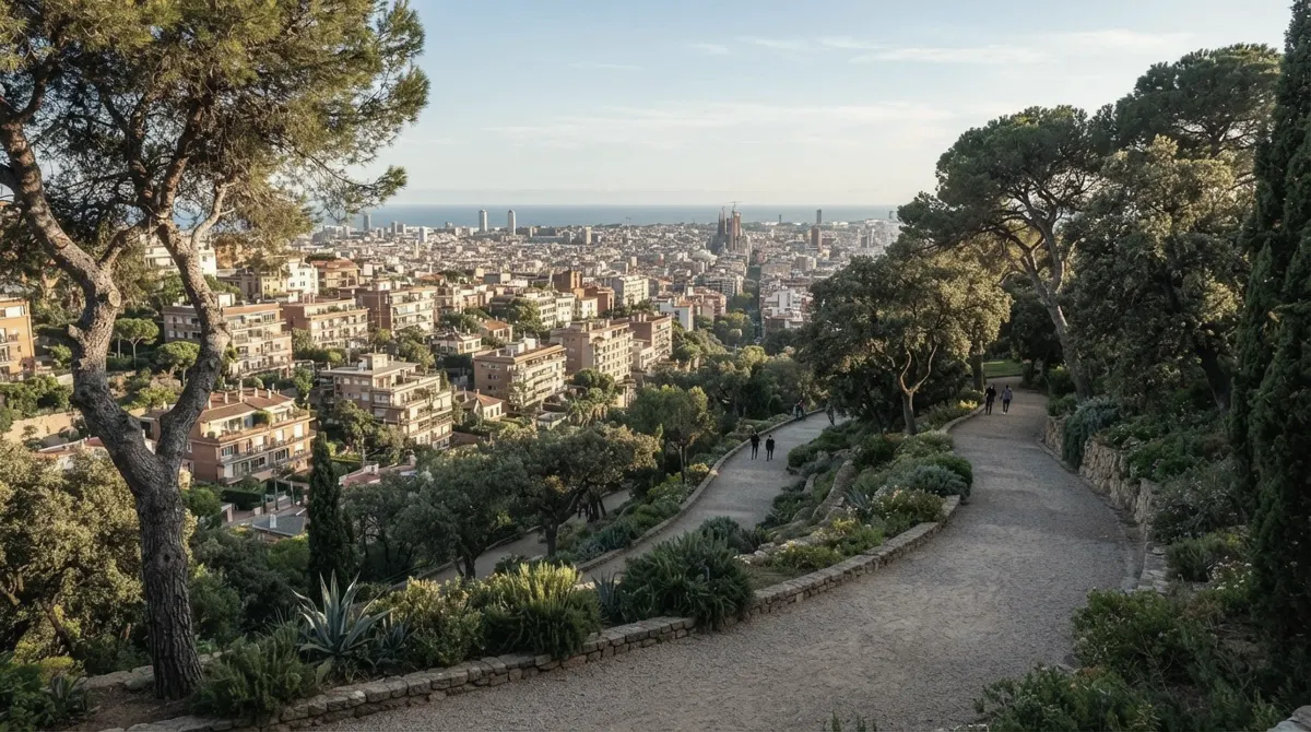 A hilltop garden with old trees and paths above villas and apartment buildings